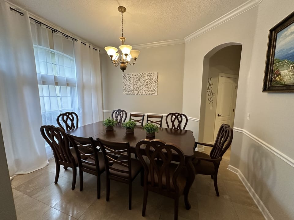 Dining room, chairs can be rearranged to fit 12 people