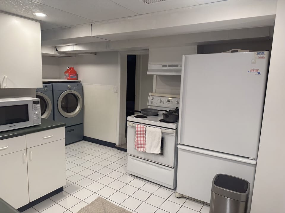 Full kitchen with in-suite laundry