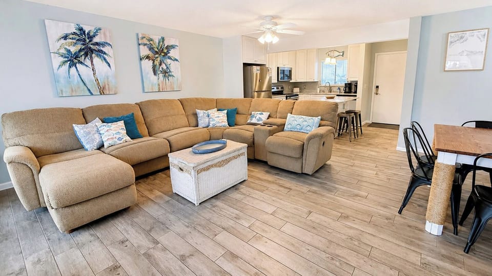 Open-concept living, dining, & kitchen space perfect for gathering with family.