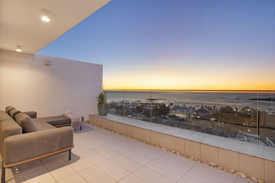 Living Room Outdoor Area Sunset View: Stunning views of the Atlantic ocean 