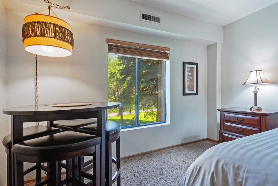Bedroom - King, Smart TV, fridge, microwave, supplies, sitting area