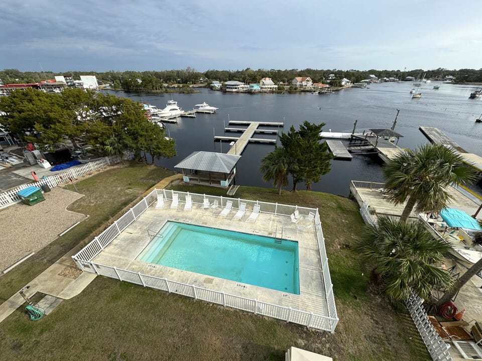 Looking down at Pool and Dock from Balcony.