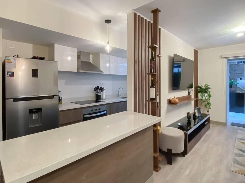 Kitchen passthrough counter to dining room.