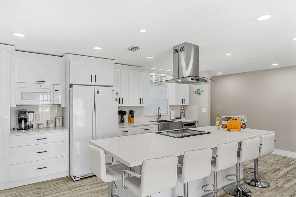 Fully equipped kitchen with modern appliances and a huge island for all your cooking needs.