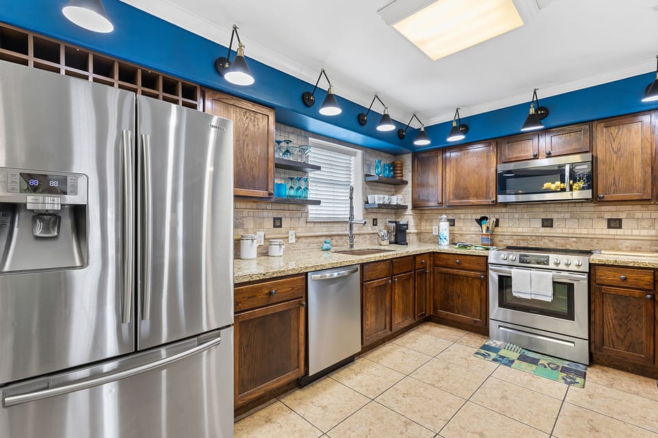 Cook with ease in the fully equipped kitchen with plenty of counter space.