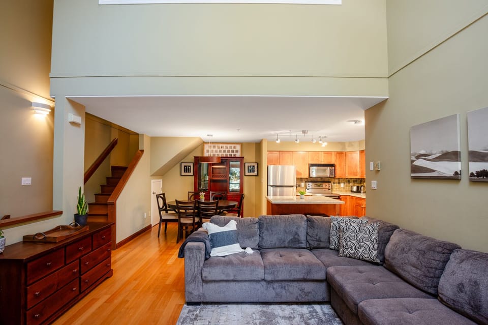 A comfortable sofa offers the perfect place to relax and unwind.
