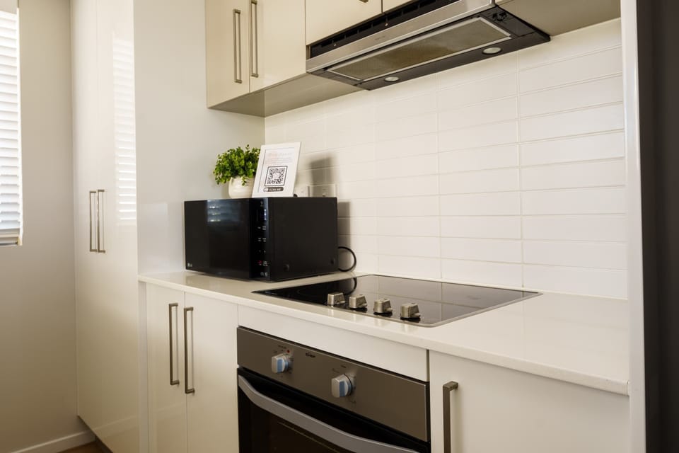 Electric oven and stovetop in the kitchen.