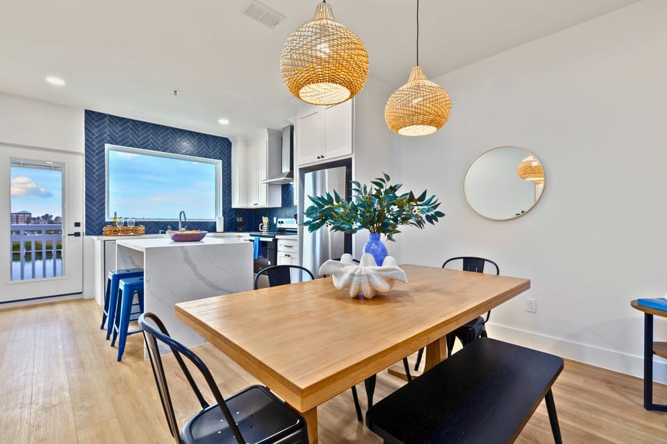 Designed for connection, the open kitchen and dining area offers everything you need to cook together and a cozy nook for sharing meals with a view.