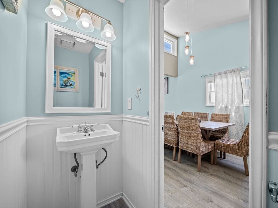 Half Bath off Kitchen and Living Area