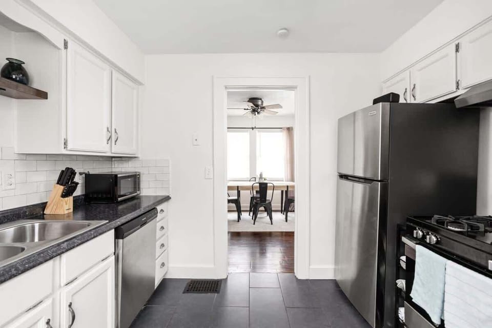 Kitchen: Sleek cabinetry and modern appliances await your culinary adventures in this stylish space!