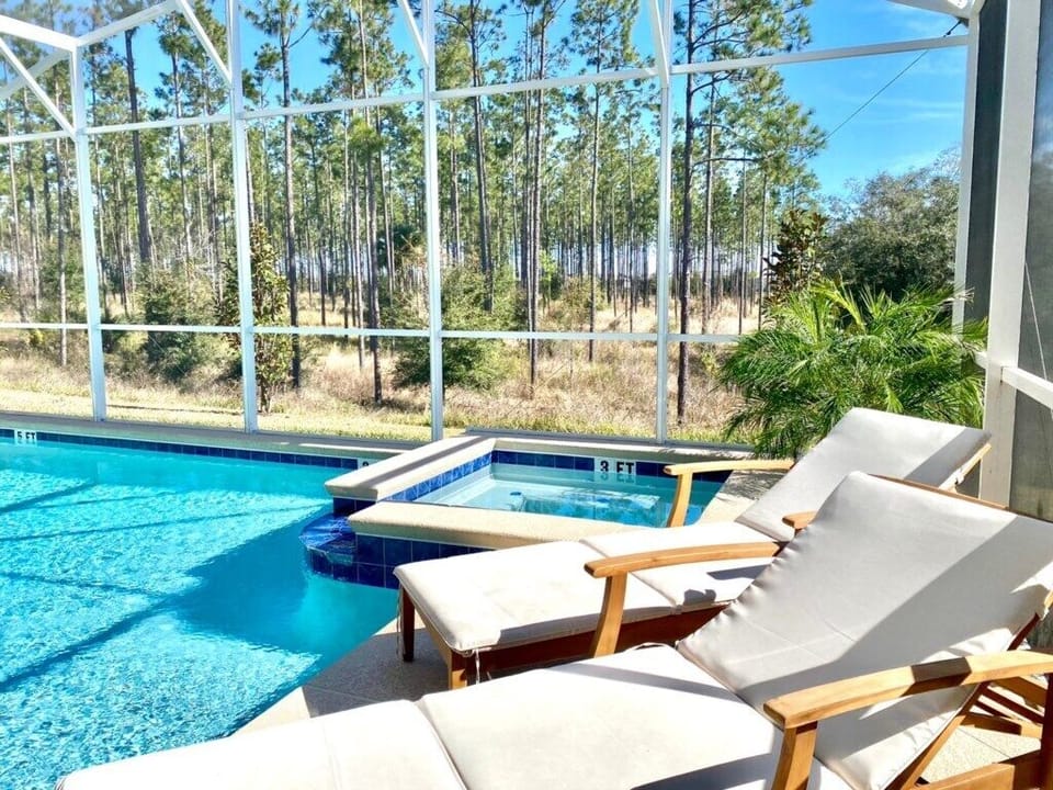Private pool area, launge chairs and patio furniture