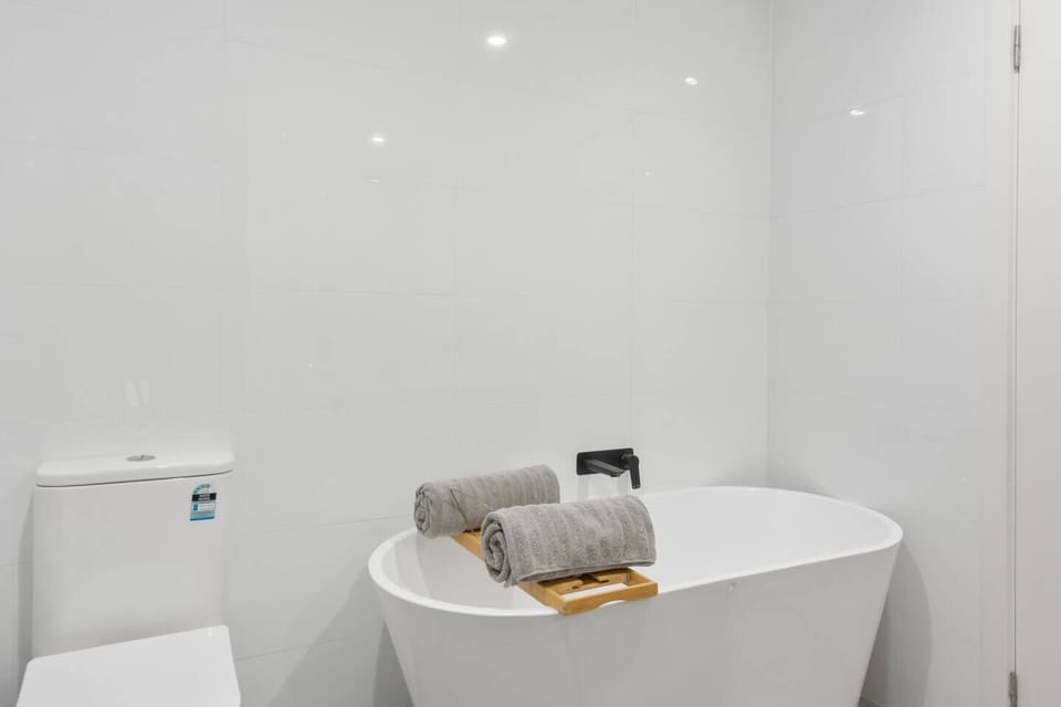 Unwind in the freestanding bath after a day's adventure in the bathroom. 