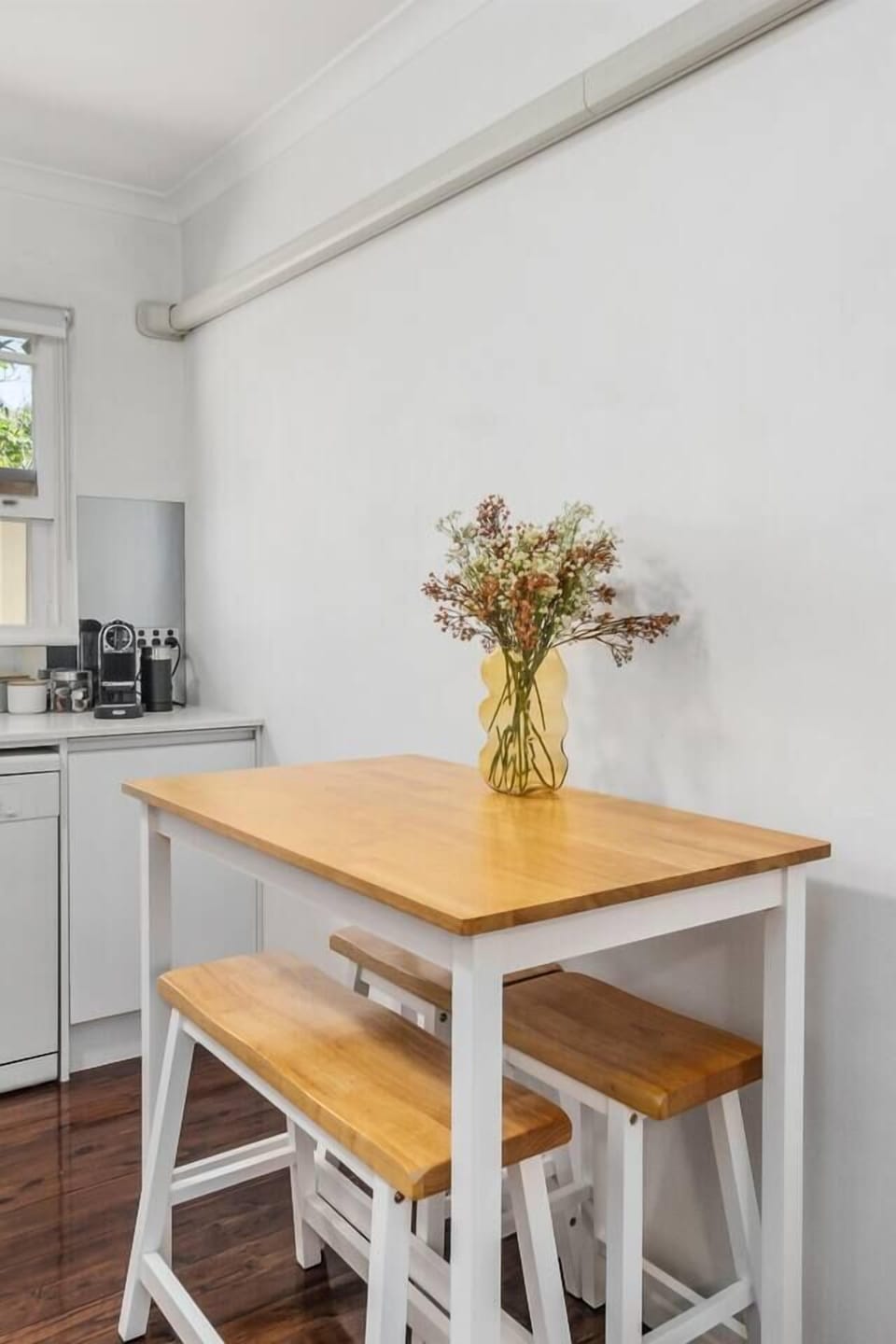 A breakfast bar provides more seating to prepare meals or doubles as a dedicated workspace to set up your laptop.