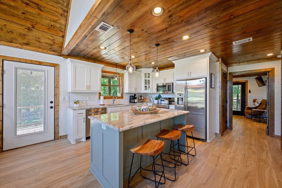 Inviting kitchen island with warm lighting perfect for cozy family gatherings.