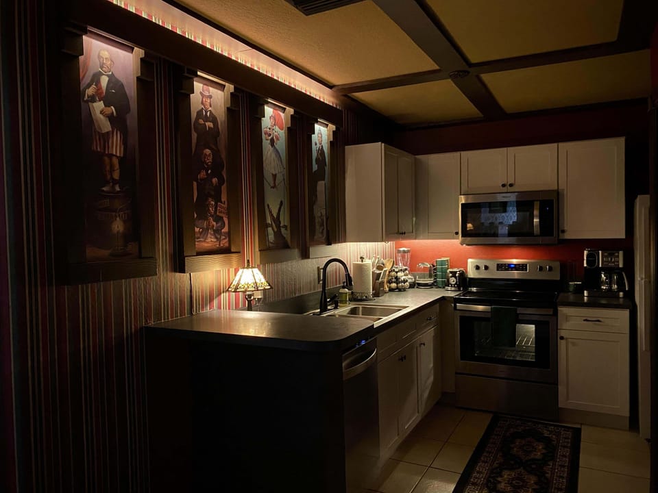 Our fully stocked kitchen features portraits of some of our prior guests.