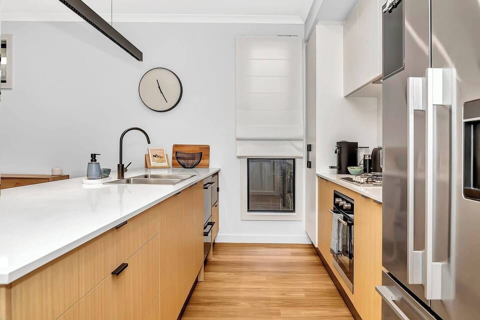 Cook up a feast in the gourmet kitchen, equipped with high-quality appliances and cooking utensils.
