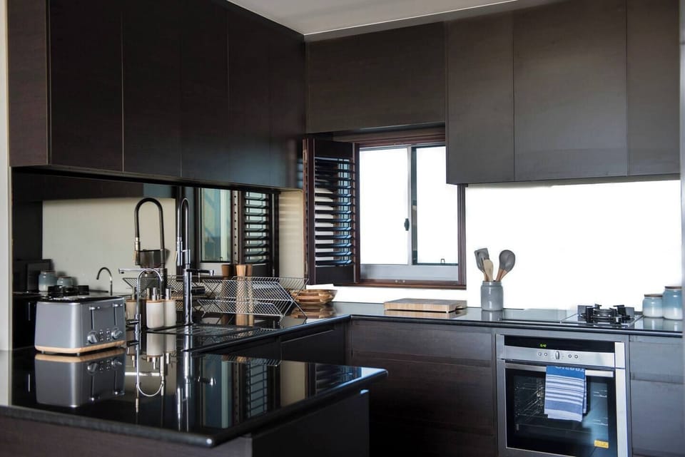 Fully-equipped modern kitchen has all the appliances and utensils you need to cook and host a great meal