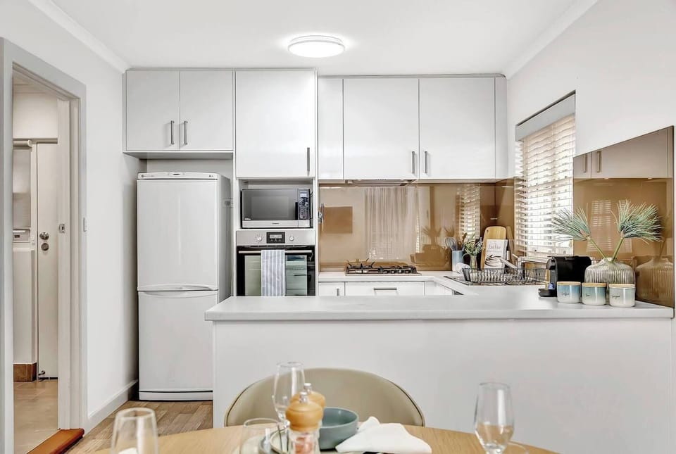 Unleash your culinary creativity in the fully-equipped kitchen with a large countertop, making food prep easy. 