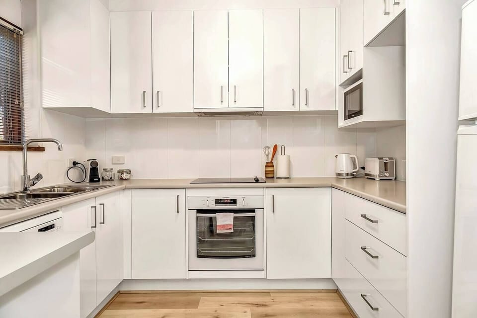 Whip up a quick breakfast or prepare a gourmet meal in the fully-equipped kitchen, complete with modern appliances. 
