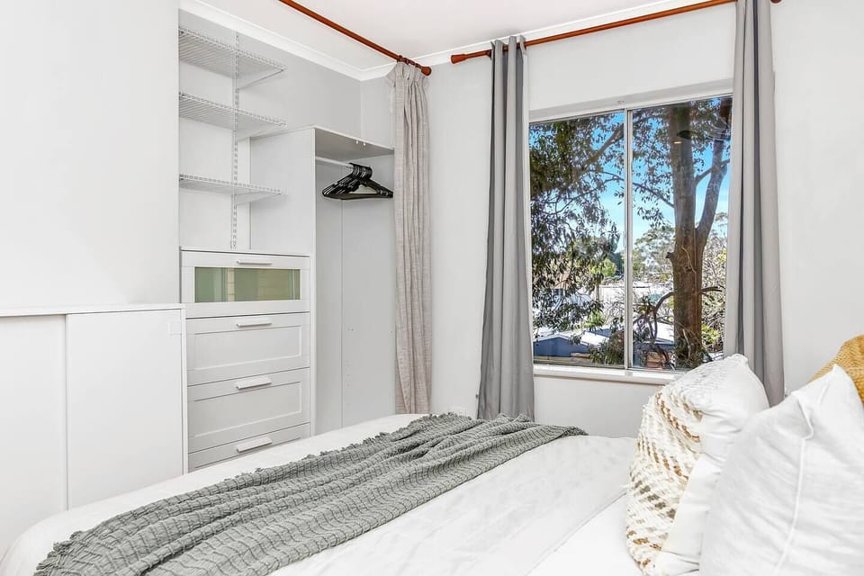 Conveniently store your clothing in the primary bedroom's spacious dresser.