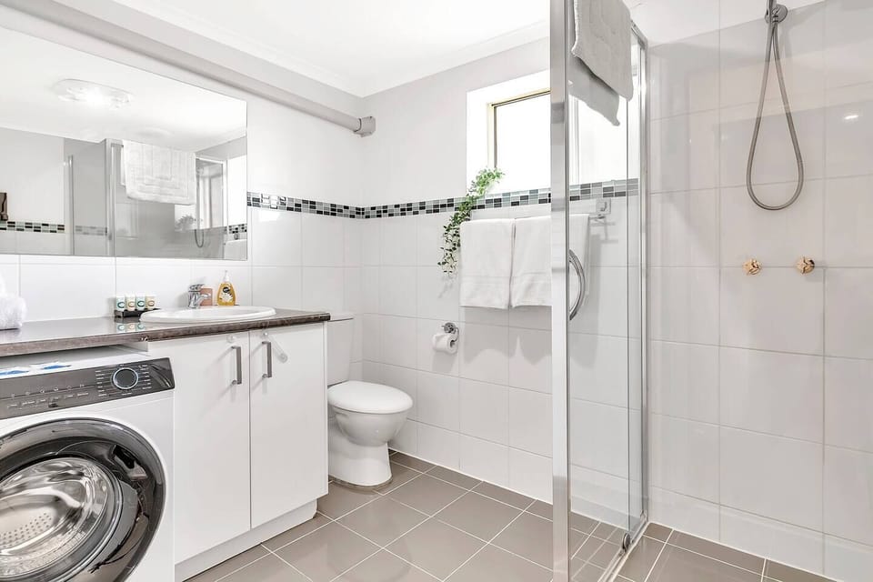 Pamper yourself in the spacious bathroom complete with a generous walk-in shower and complimentary toiletries.
