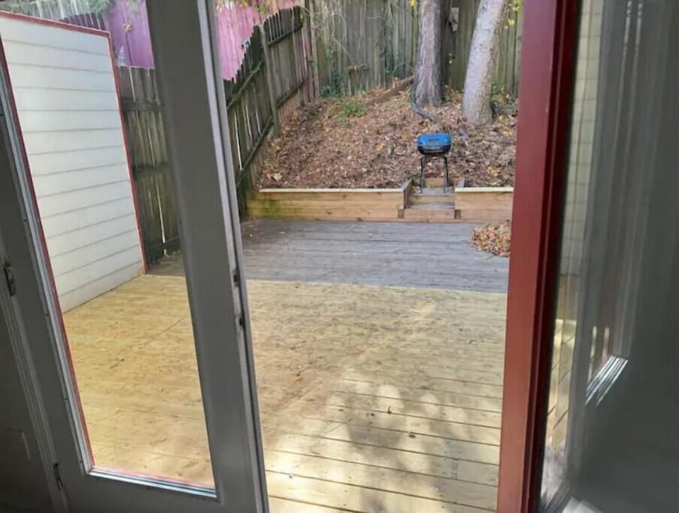 French doors open from the living room onto an expansive deck. Great for groups.