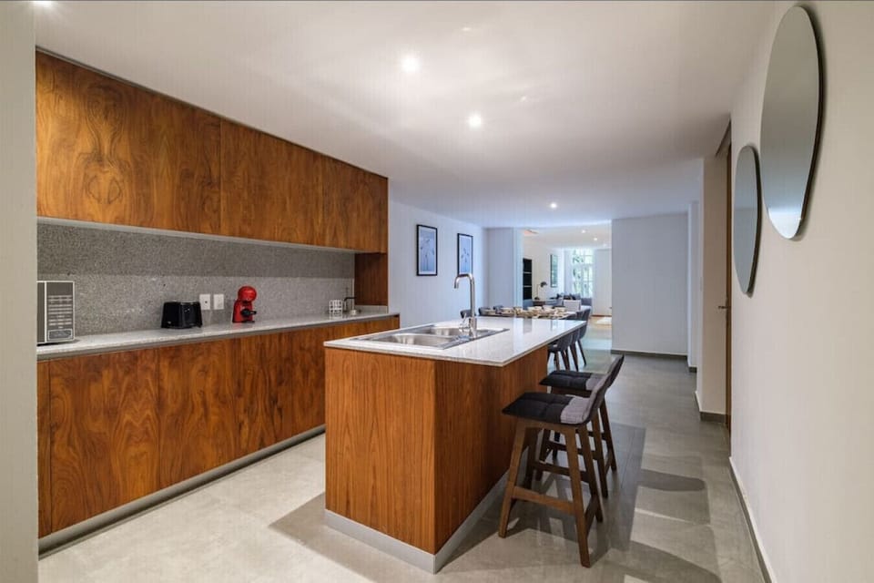 Kitchen with two bar chairs for a quick meal