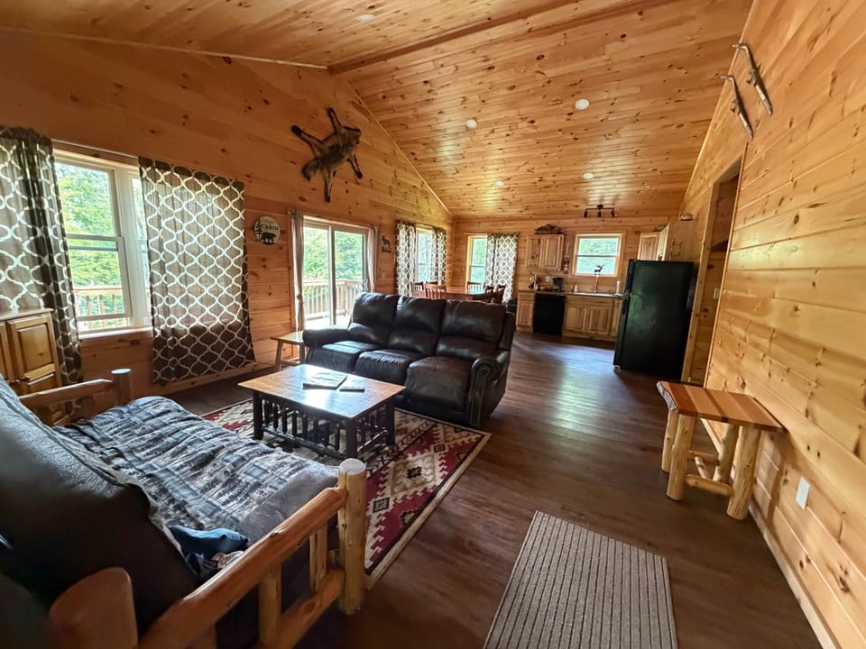 Living room with futon and reclining couch