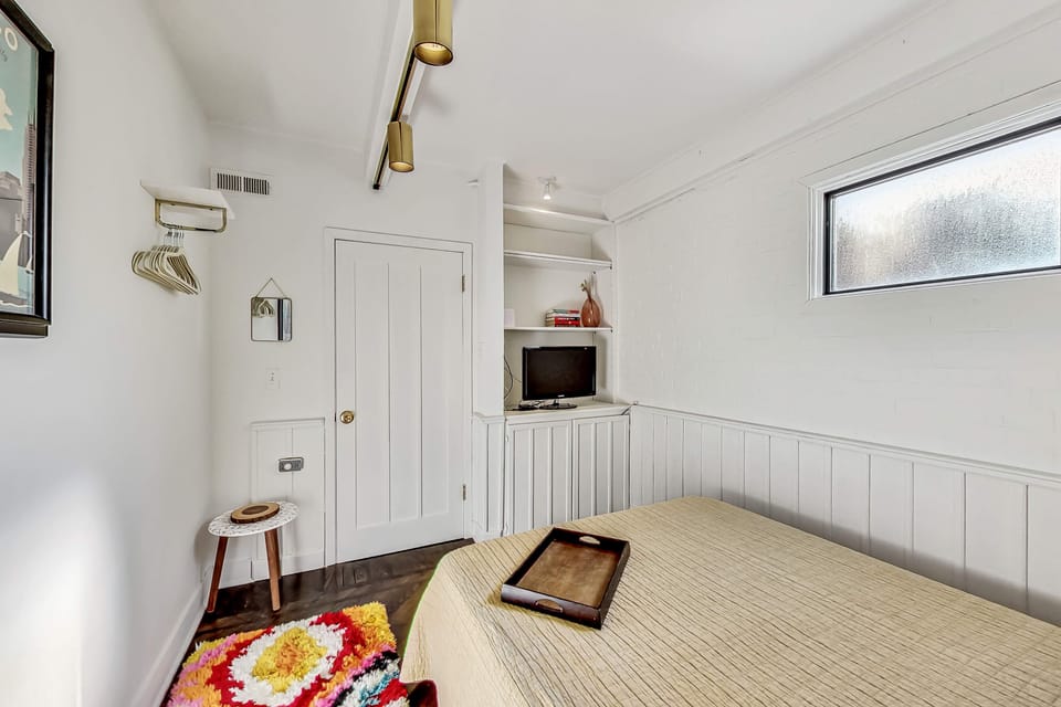 The 2nd bedroom has built-in storage and flat-screen tv with Roku.