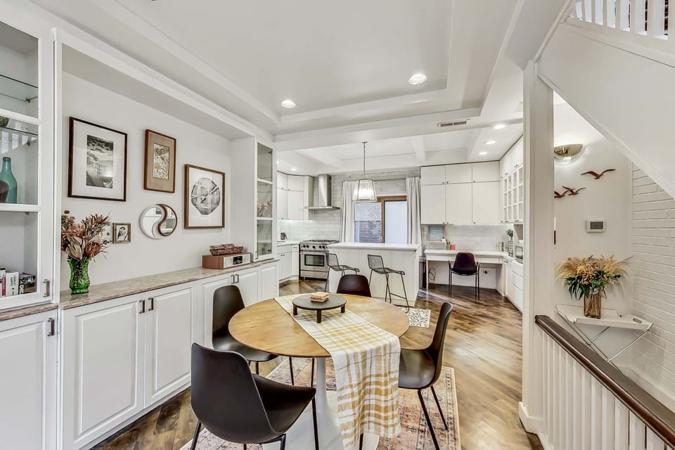 View of the dining room looking into the kitchen.