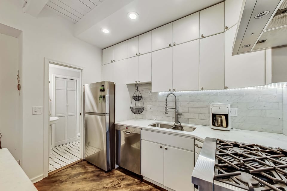 There is a half bath off the kitchen.