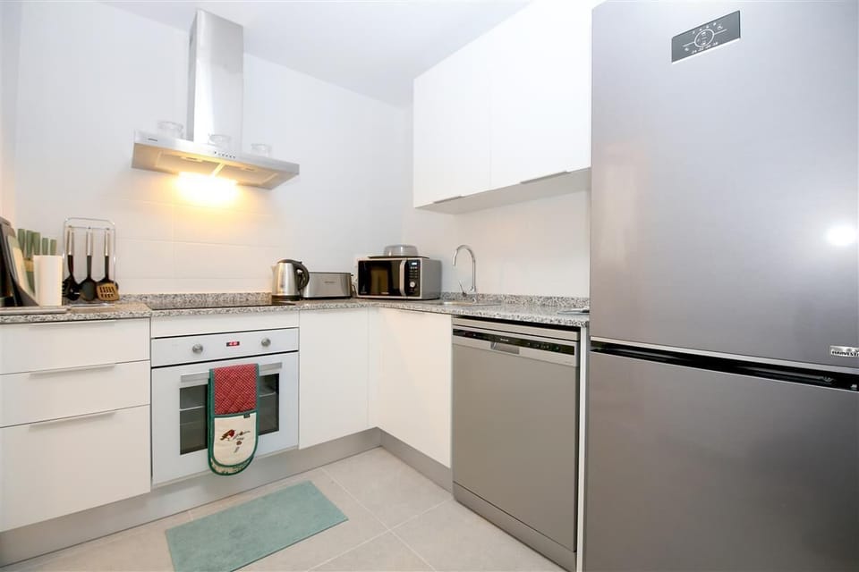 Modern kitchen is fully equipped with all the appliances