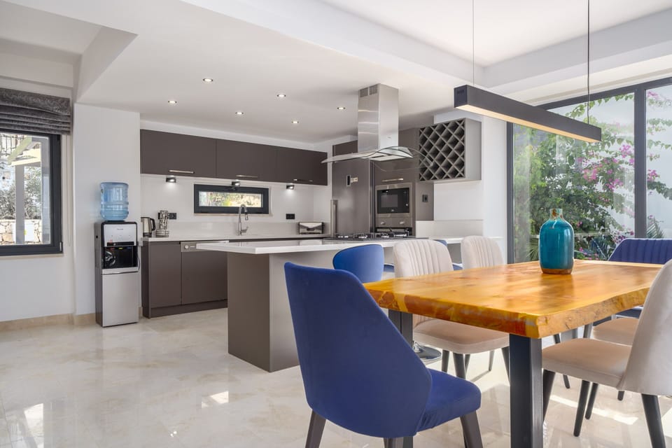 Modern lounge area and open plan fully fitted kitchen