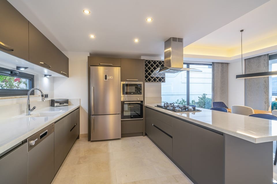 Modern fully fitted kitchen with an island unit