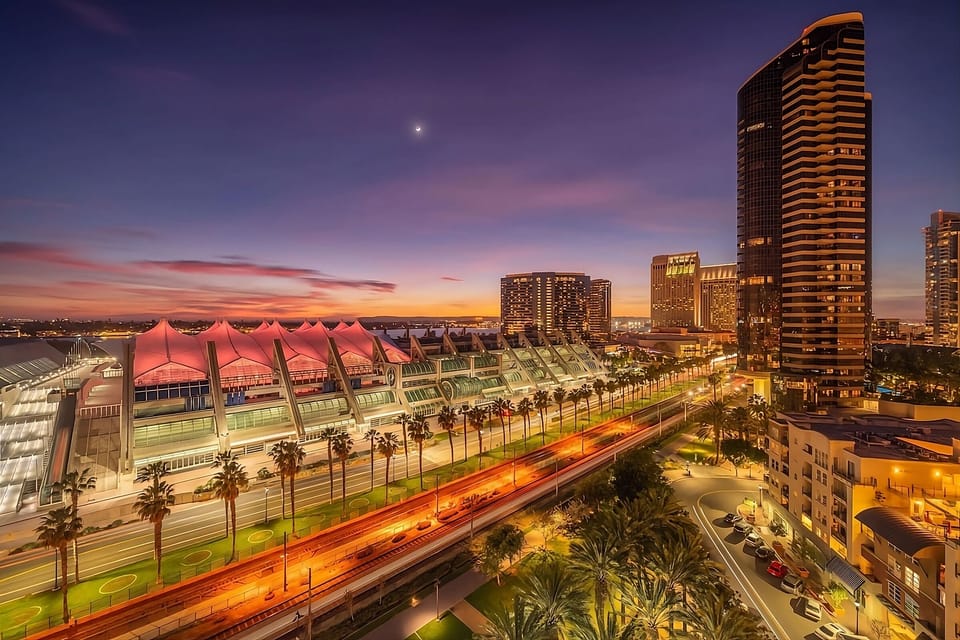 Soak in dazzling sunset city views before your stay begins