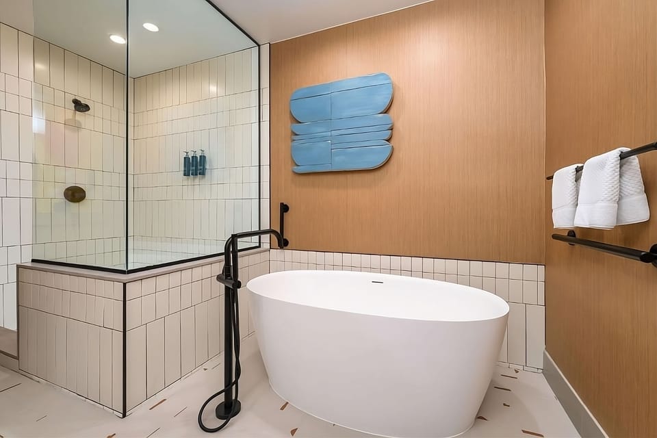 Soak luxuriously in the freestanding tub after a long day.