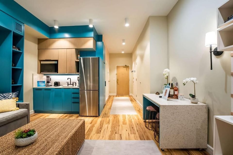 Arrive effortlessly to a bright entry leading into your suite.