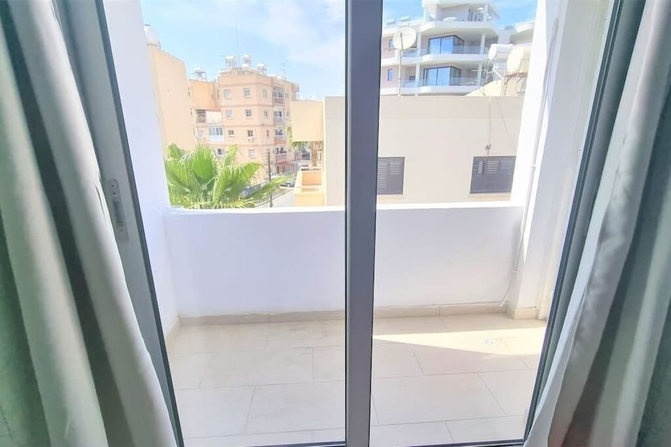 Balcony from Room 1 and Kitchen