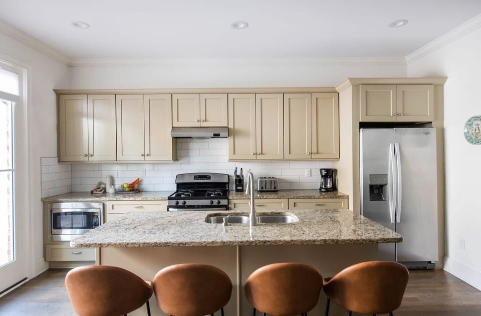 Fully Stocked Kitchen with Island Seating for 4 on the first floor
