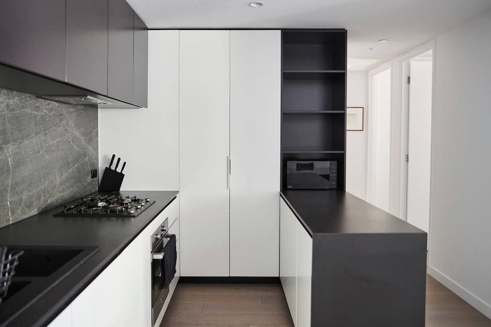 A modern culinary haven awaits you in the fully-equipped kitchen, boasting premium appliances and ample benctop space to inspire your inner chef.