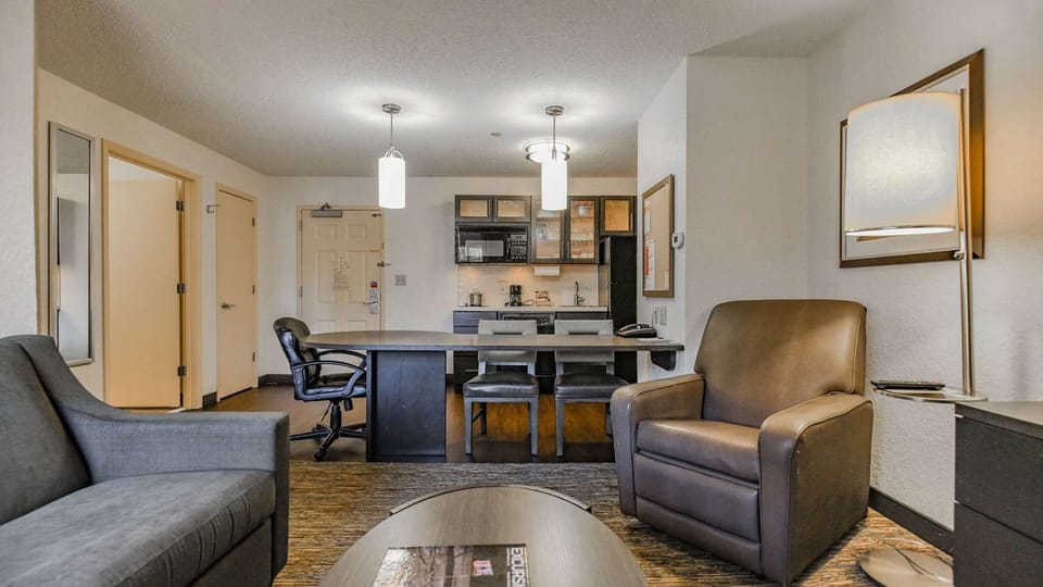 Gather for drinks and meals in the open, comfortable living area.