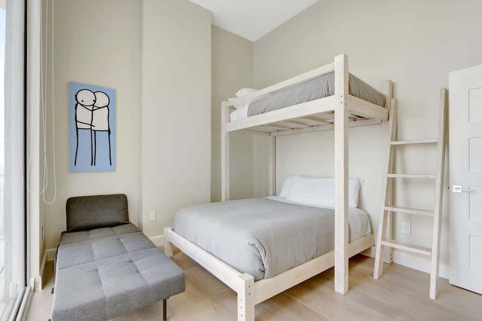 Third bedroom featuring a Queen sized bed, full size mattress (bunk bed) and twin size bed