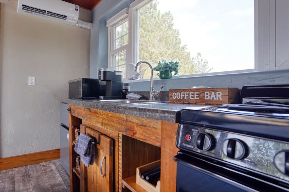 Bake, cook, sip coffee in this stocked kitchen.