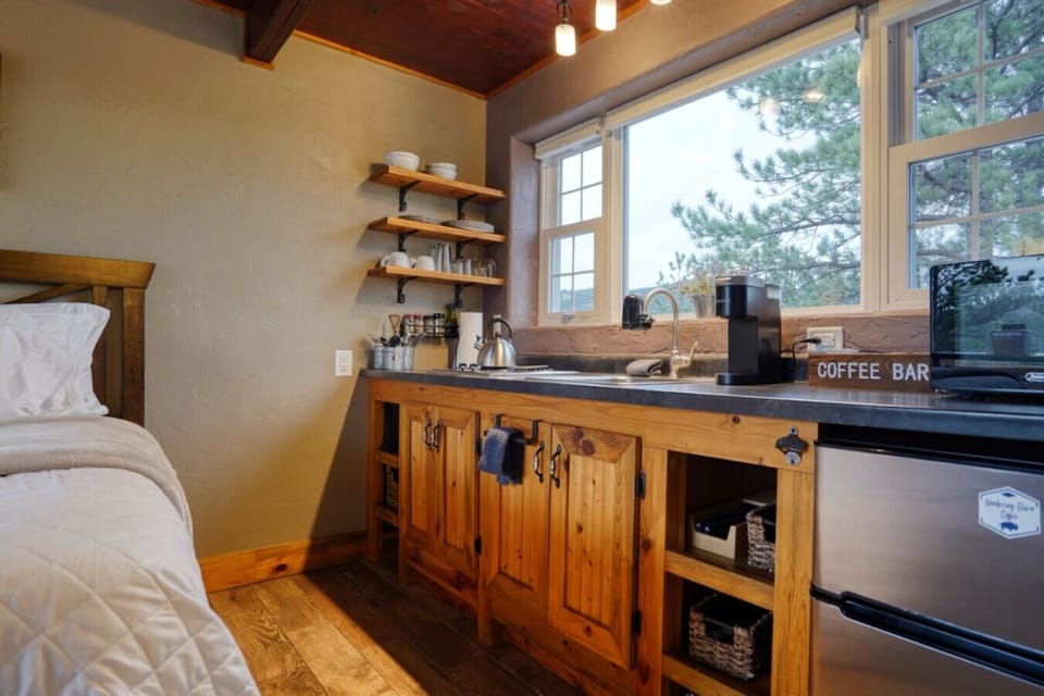 Dishes, cookware, and basic spices provided.