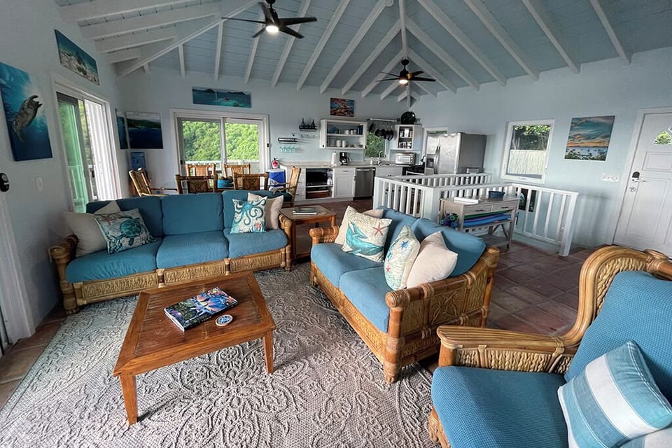 Living area with dining area and kitchen in the background
