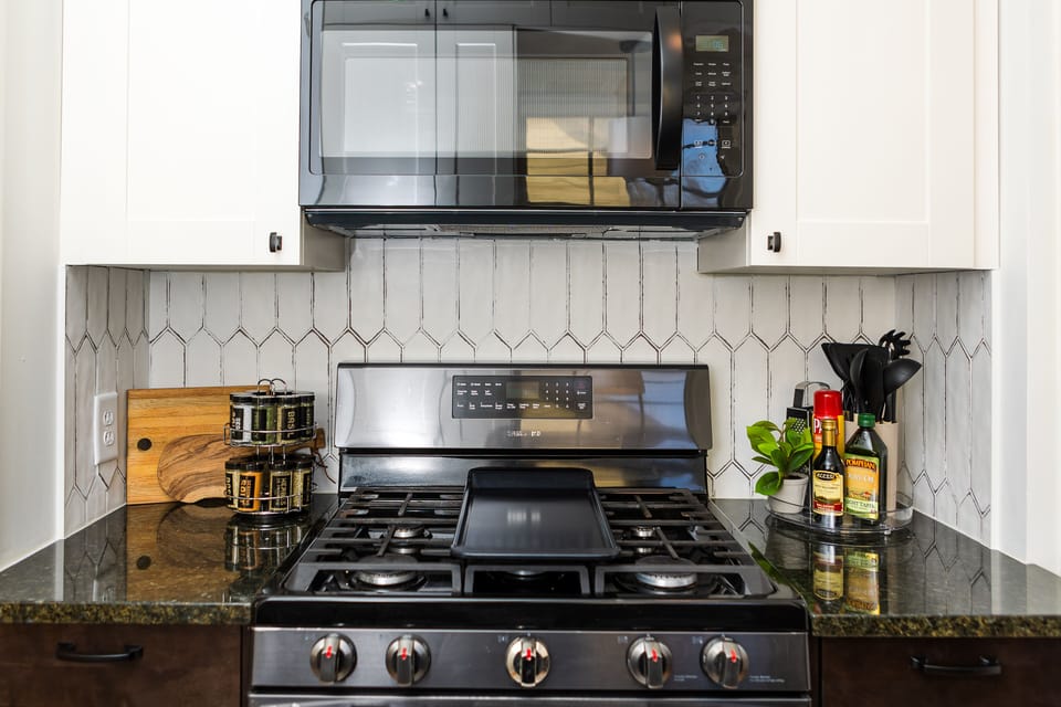 Gas stove with above microwave