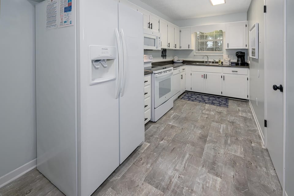 The spacious kitchen offers full size appliances!