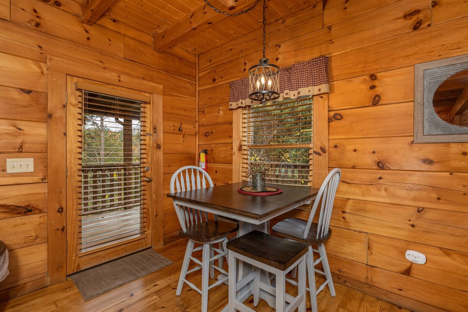 Dining table for four at Livin' Simple, a 2 bedroom cabin rental located in Pigeon Forge