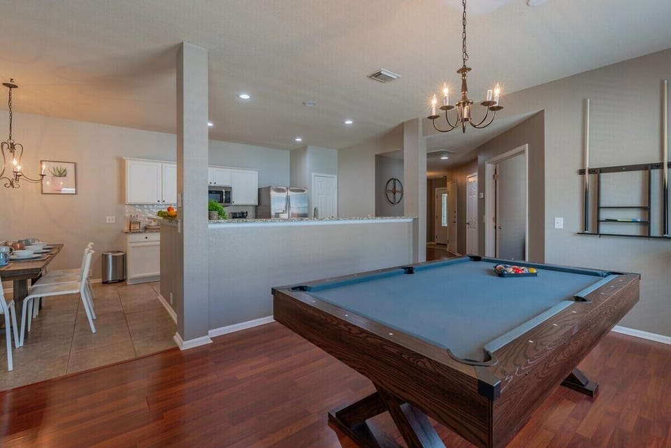 Pool table off kitchen & dining area