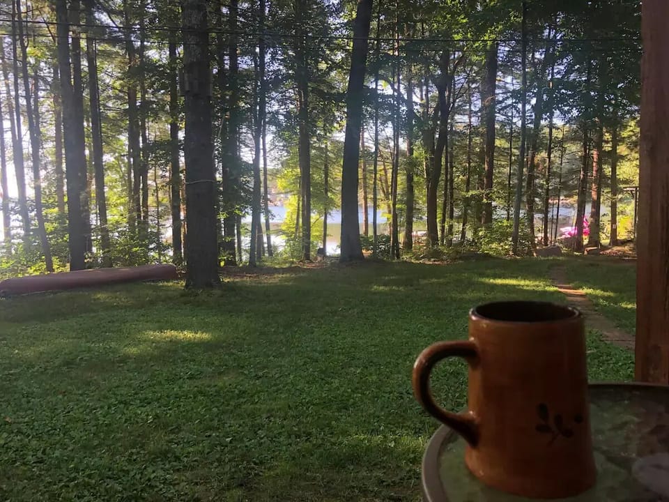 Enjoy a cup of coffee on the front porch overlooking the lake.